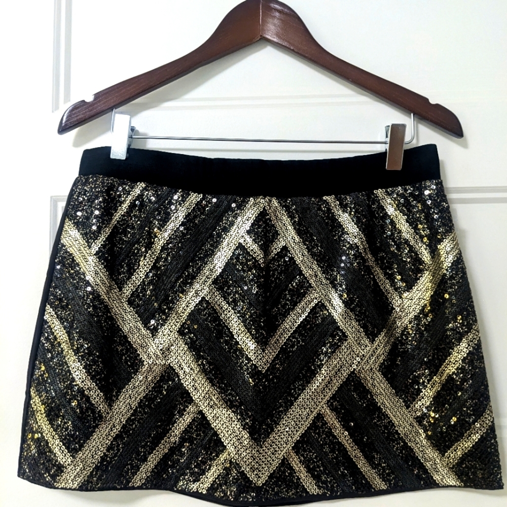 New with tags Authentic Icon mini sequin skirt.